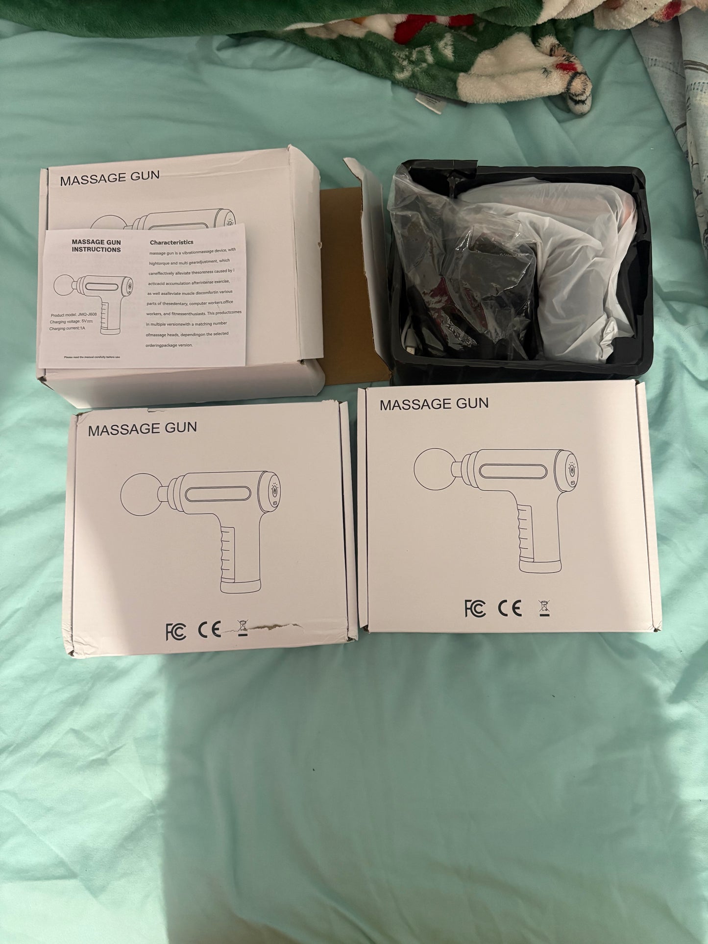 Pistola de Masaje Corporal Portátil – Negro & Dorado